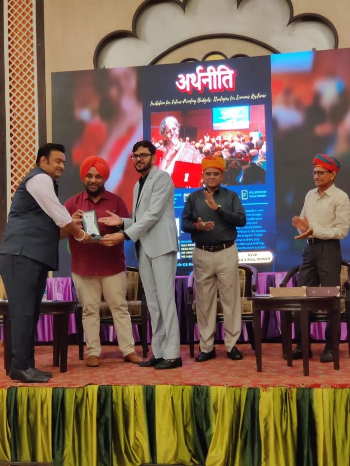 A memento on stage at अर्थनीति, a session on future-ready budgets