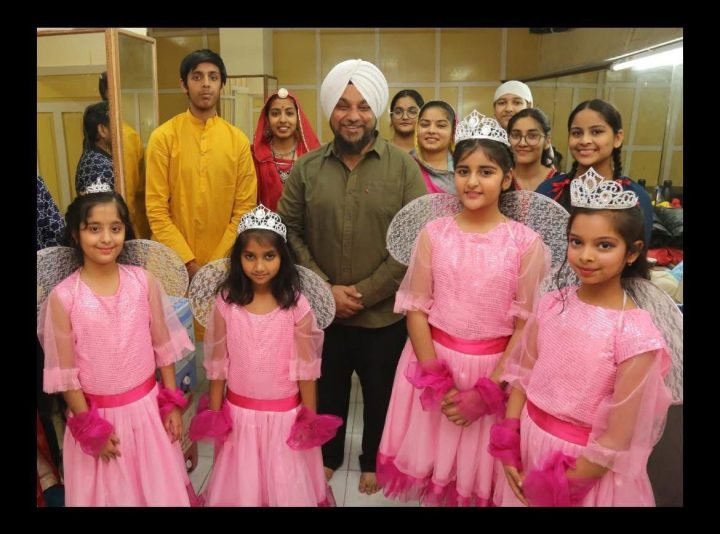 Backstage with the cast before a school performance